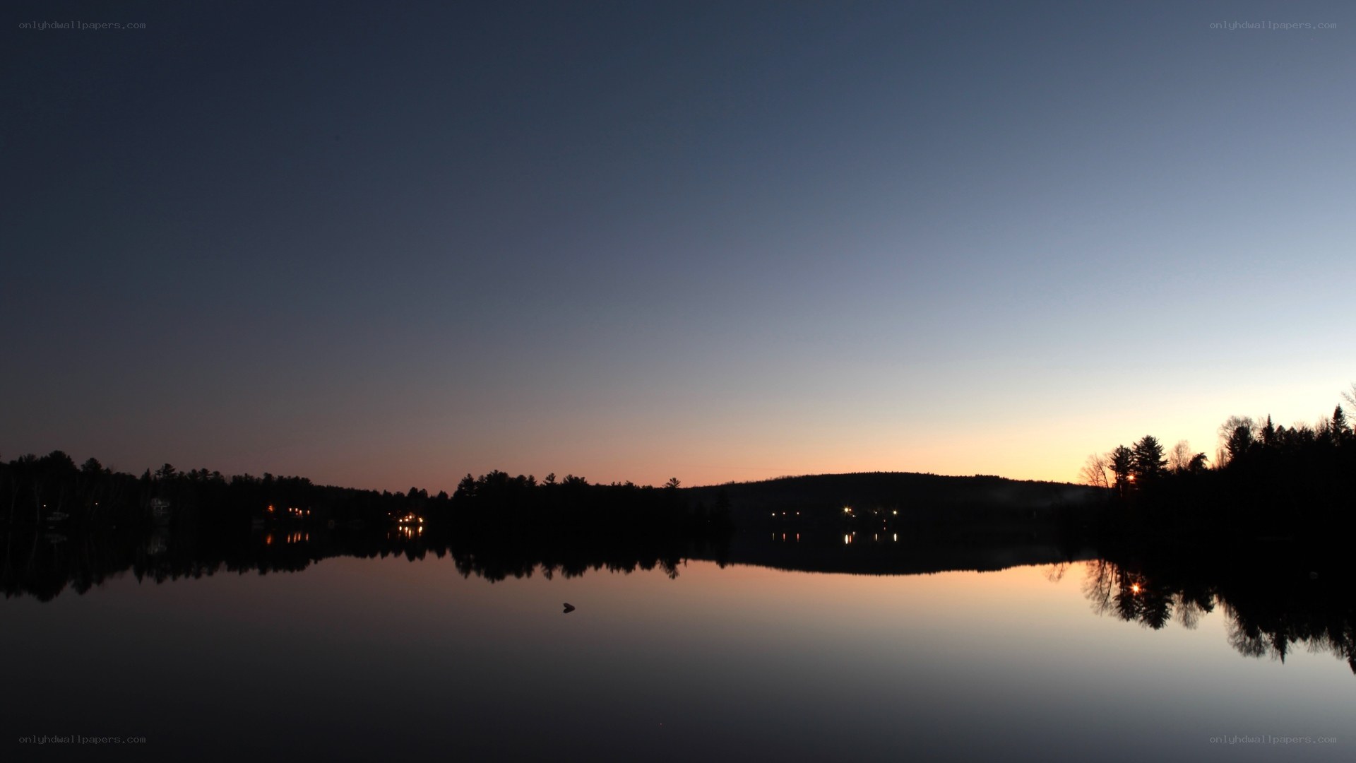 sunset over a calm lake