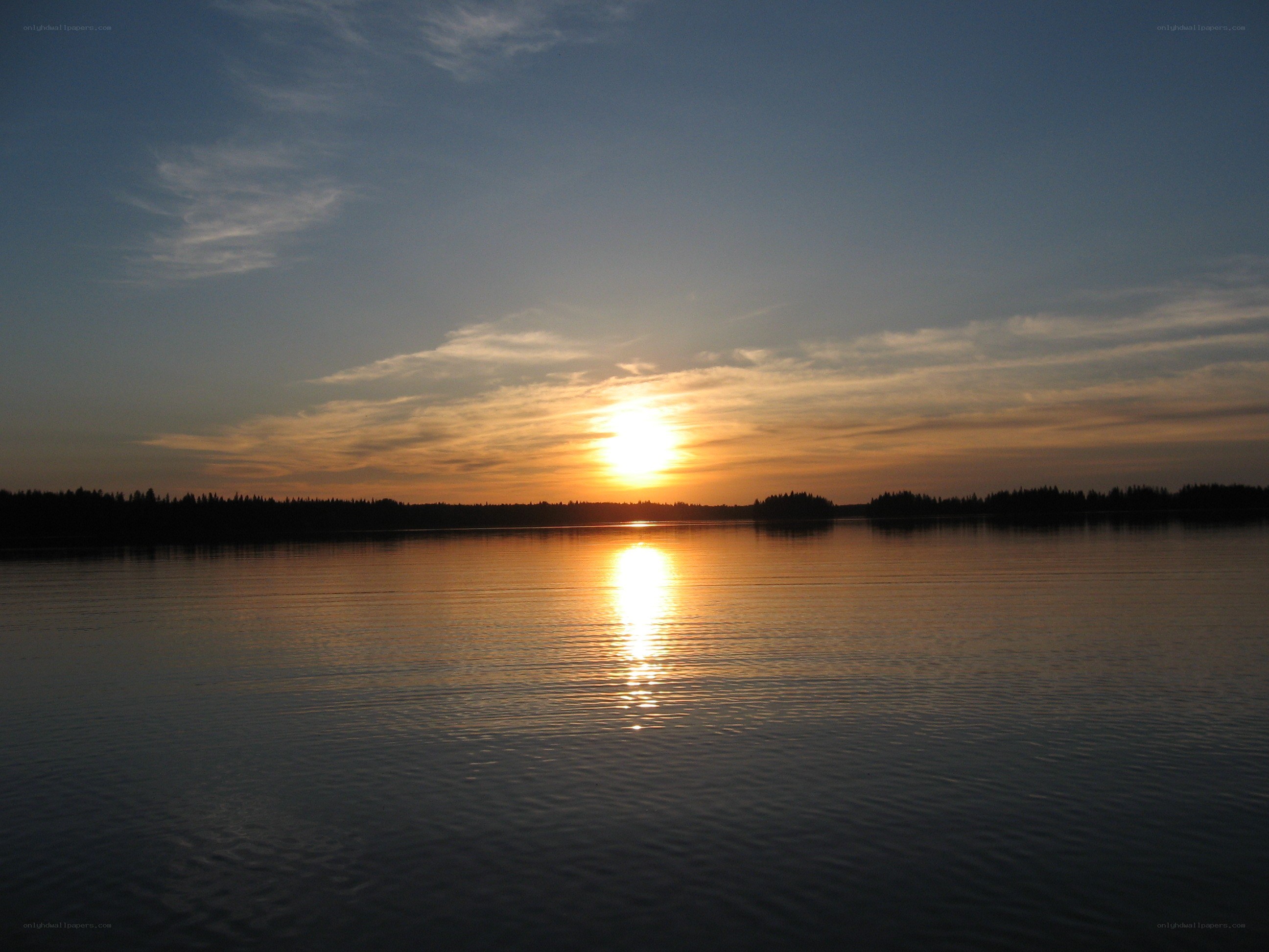 Sunset over a calm lake