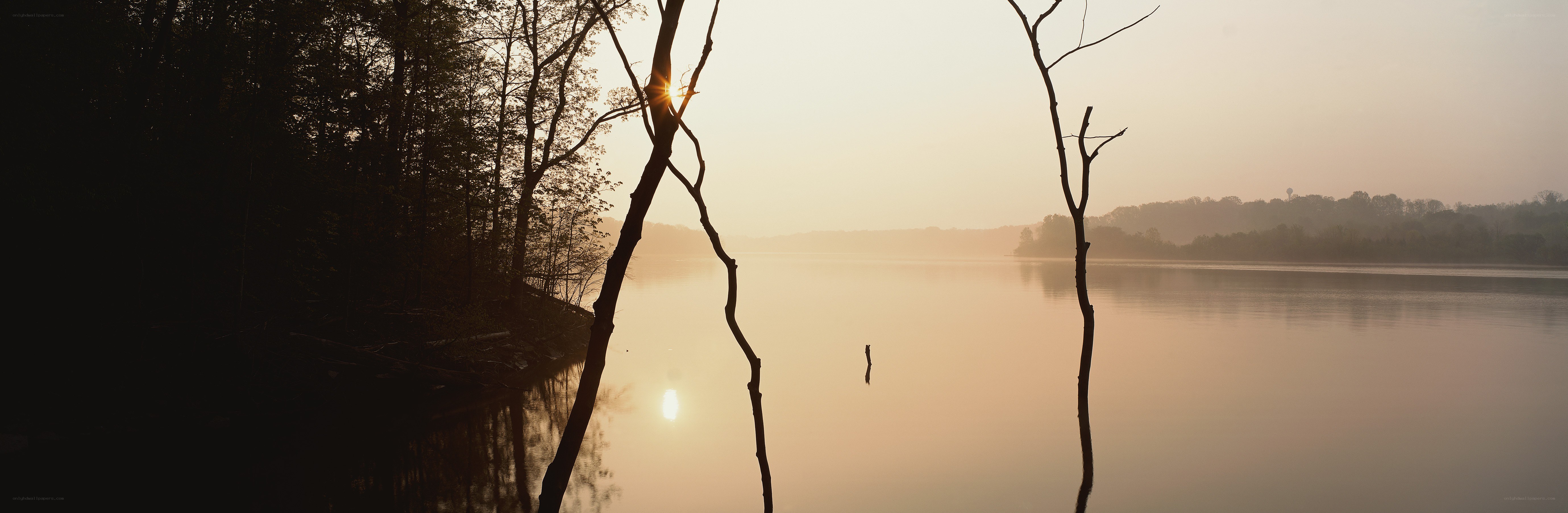sunset over a calm lake