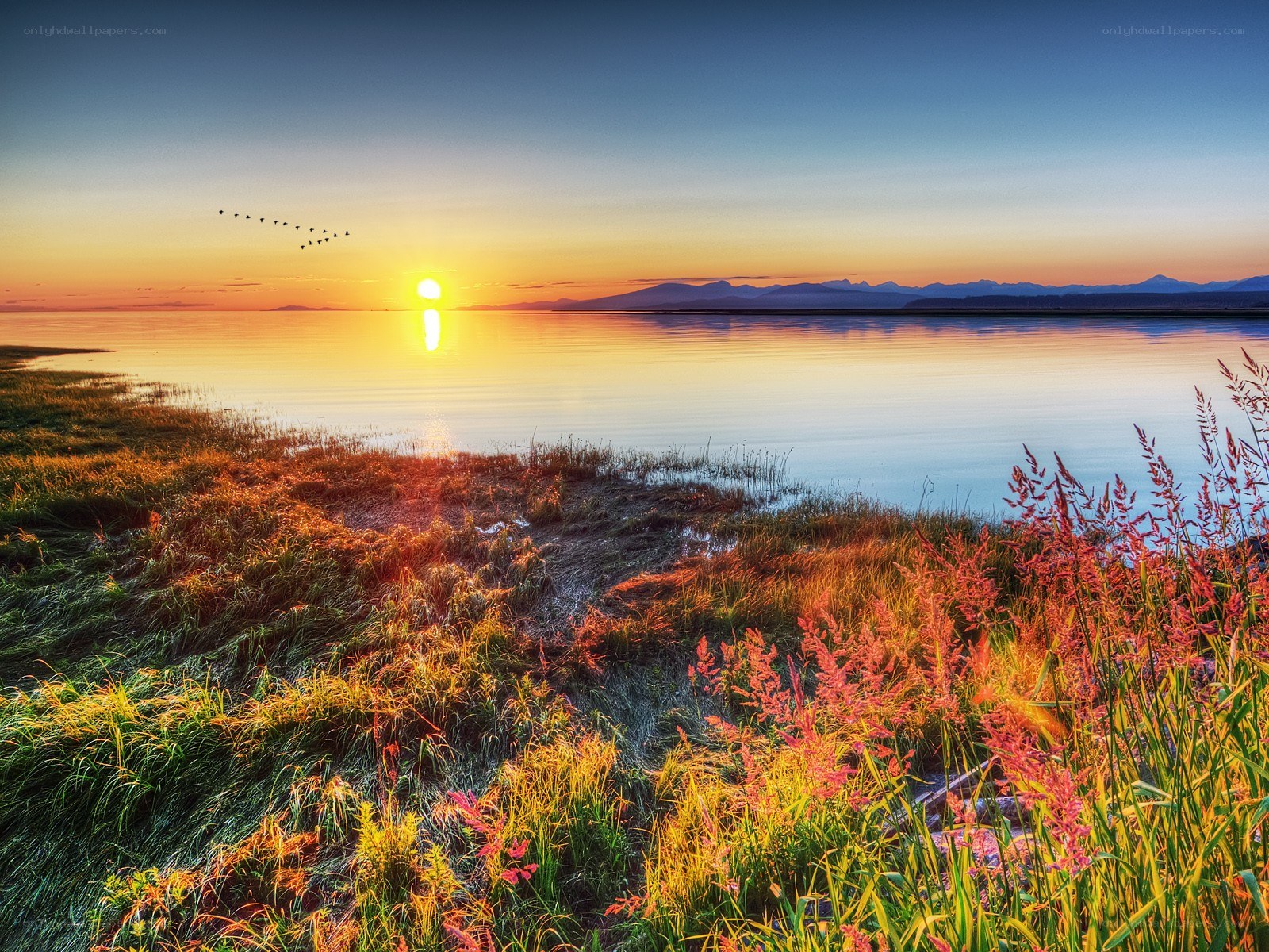 Sunset over a calm lake