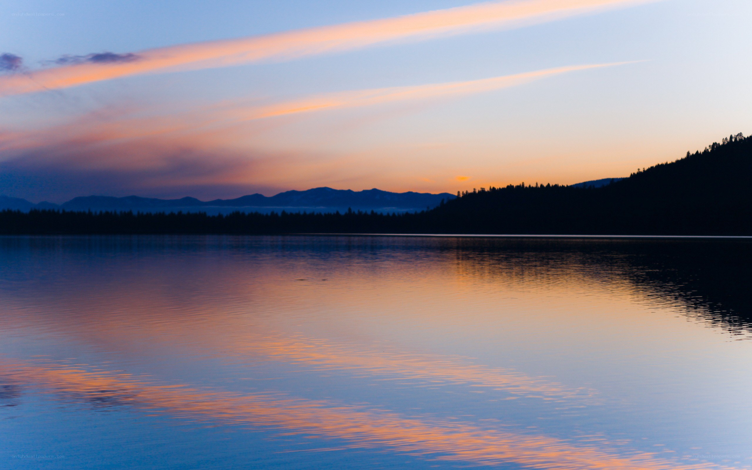 sunset over a calm lake