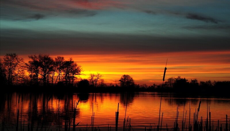 sunset over a calm lake