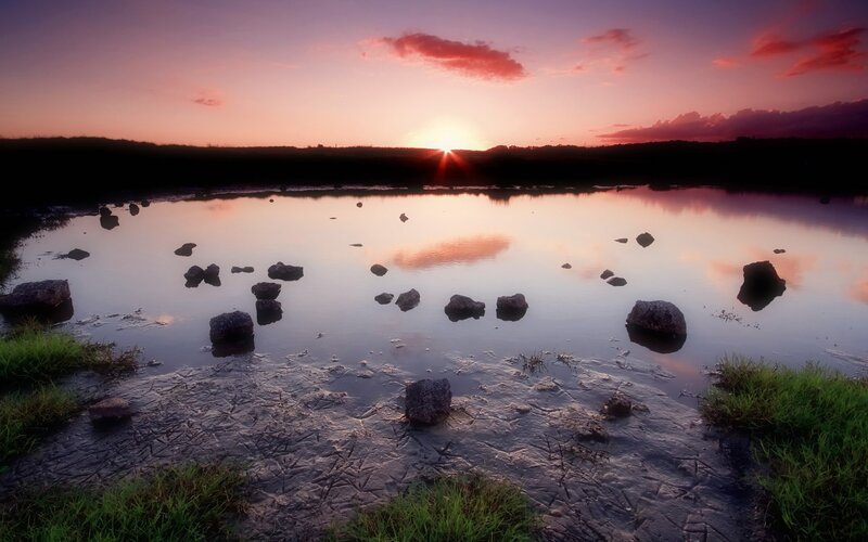 Sunset over a calm lake