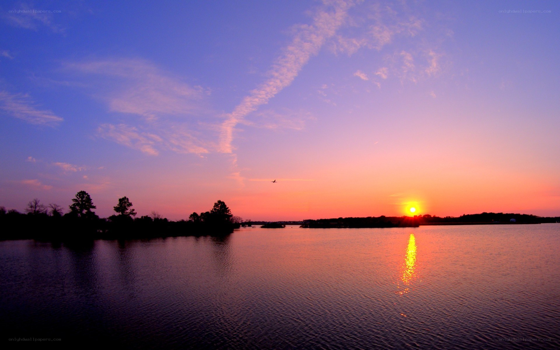 sunset over a calm lake