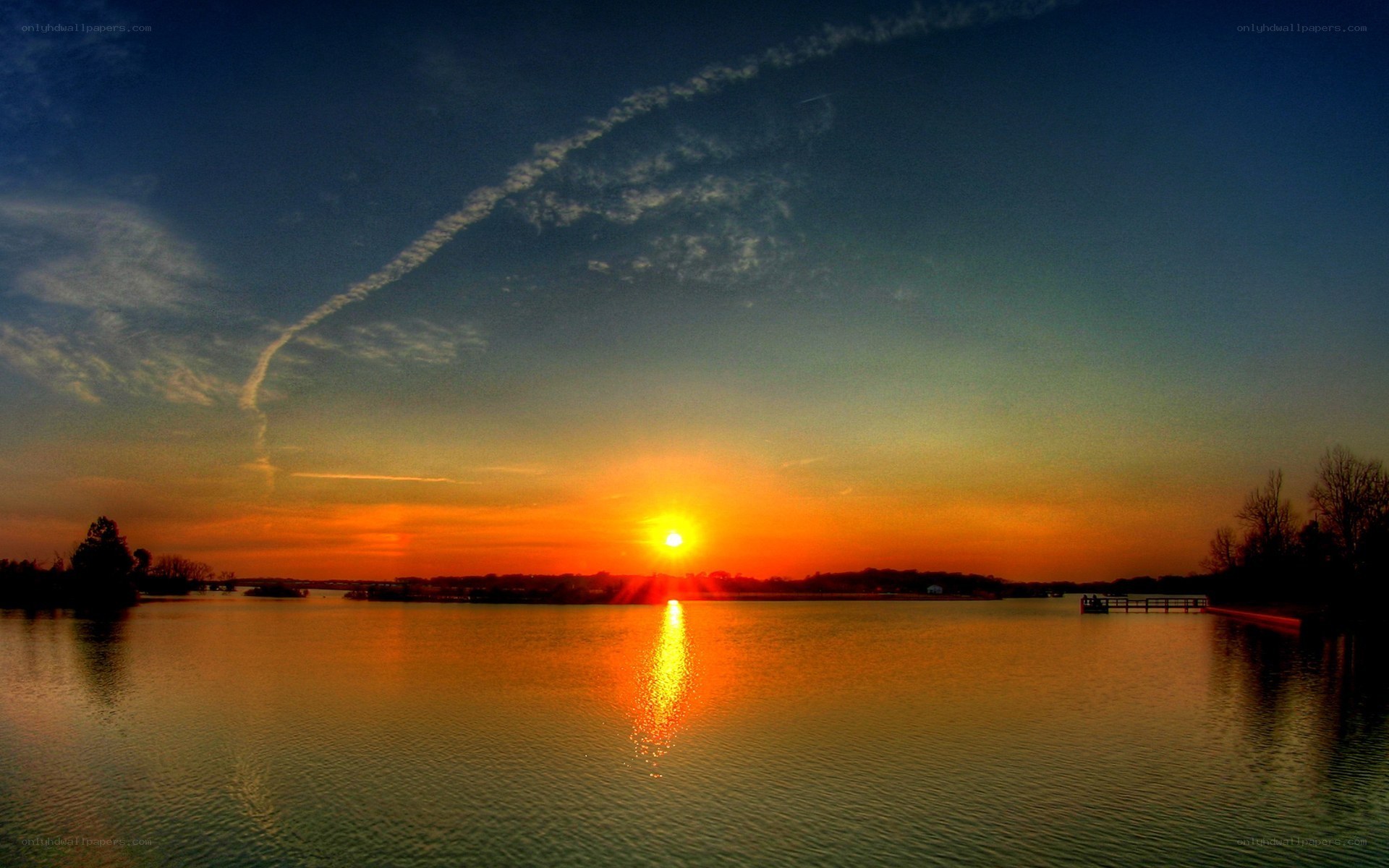 sunset over a calm lake