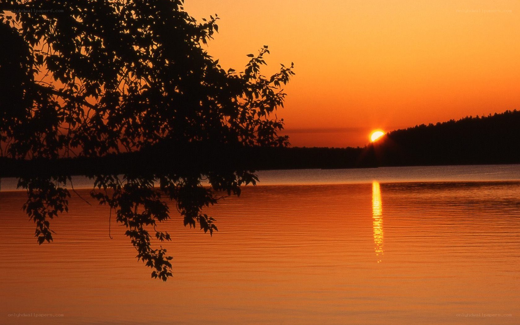 Sunset over a calm lake