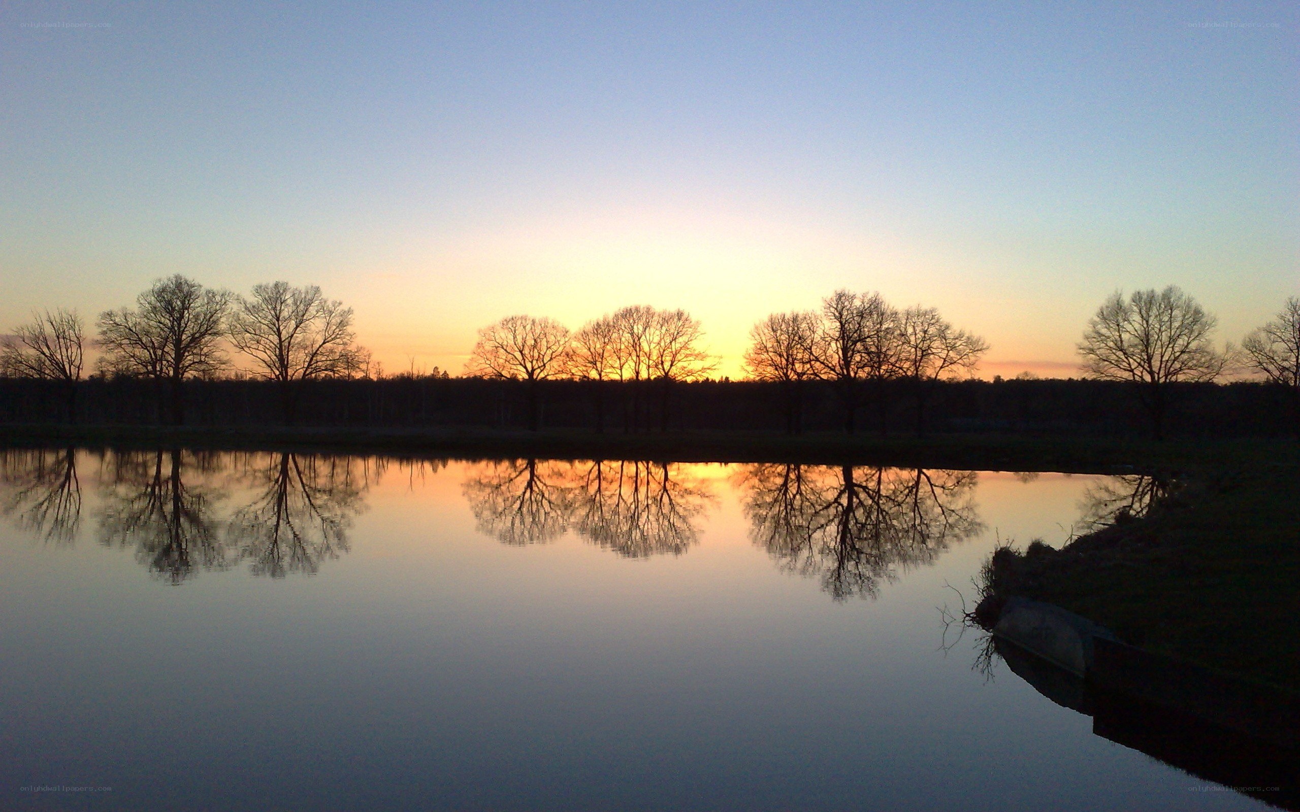 Sunset over a calm lake