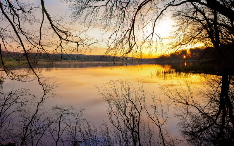 Sunset over a calm lake