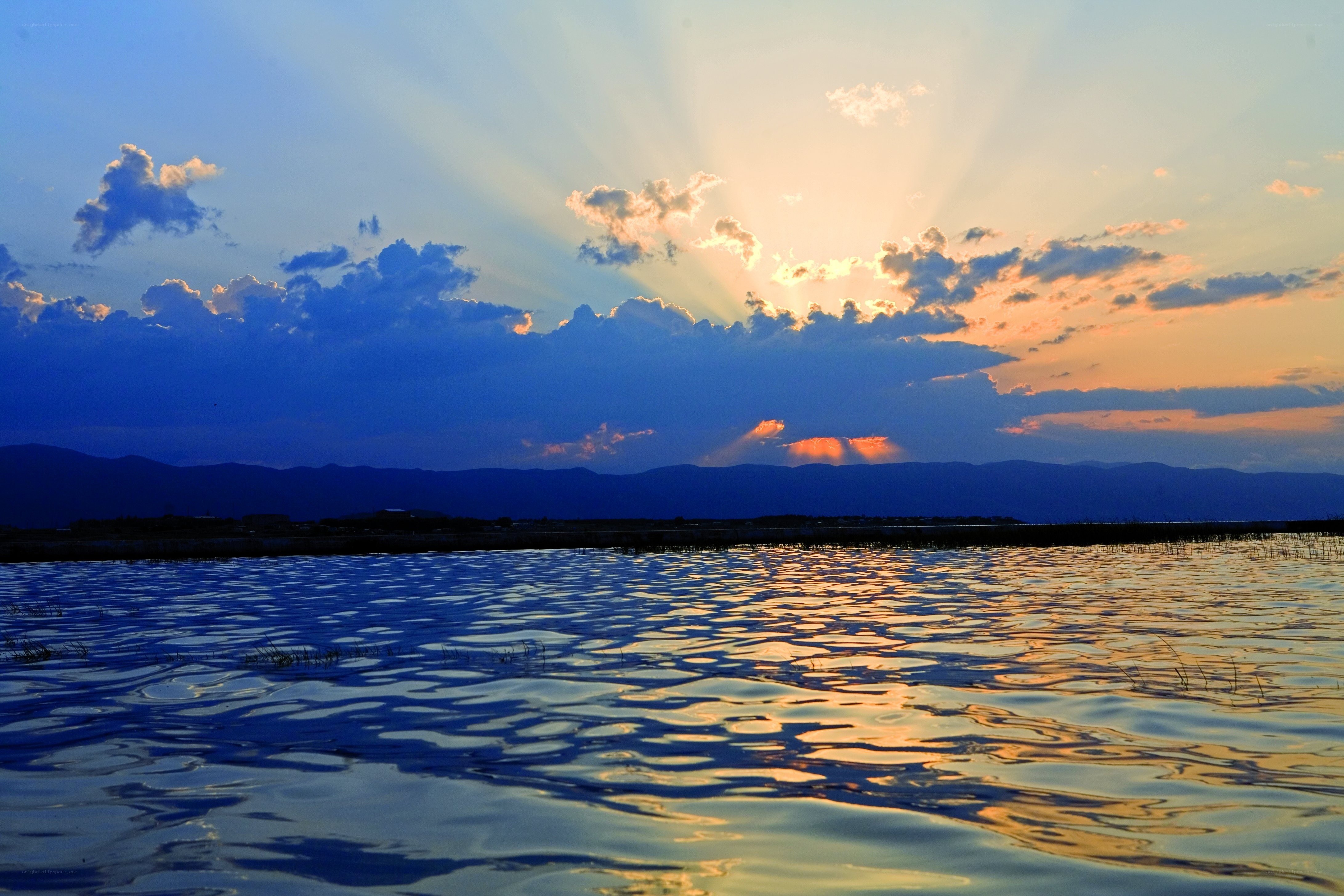 Sunset over a calm lake