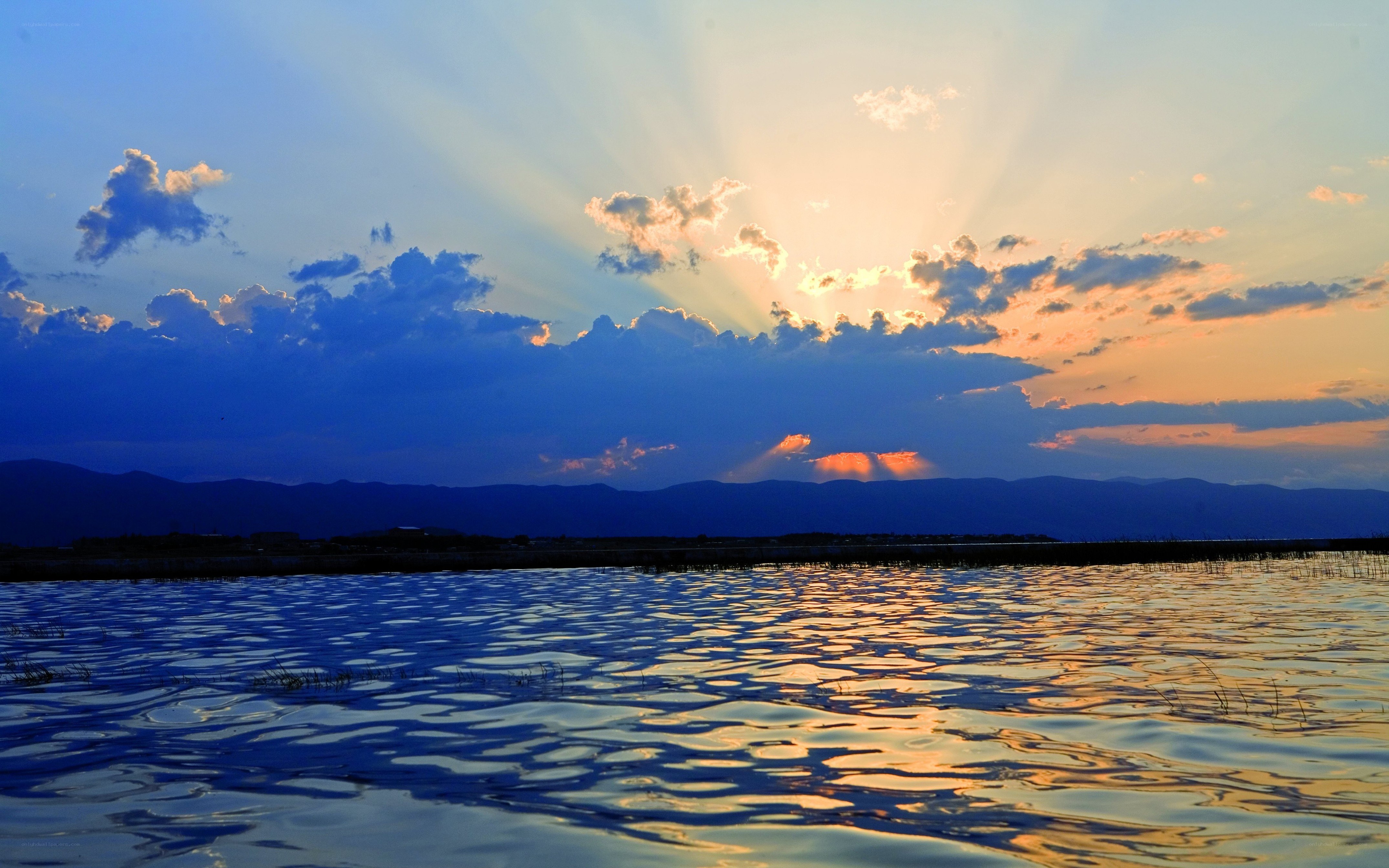Sunset over a calm lake