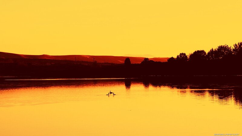Sunset over a calm lake