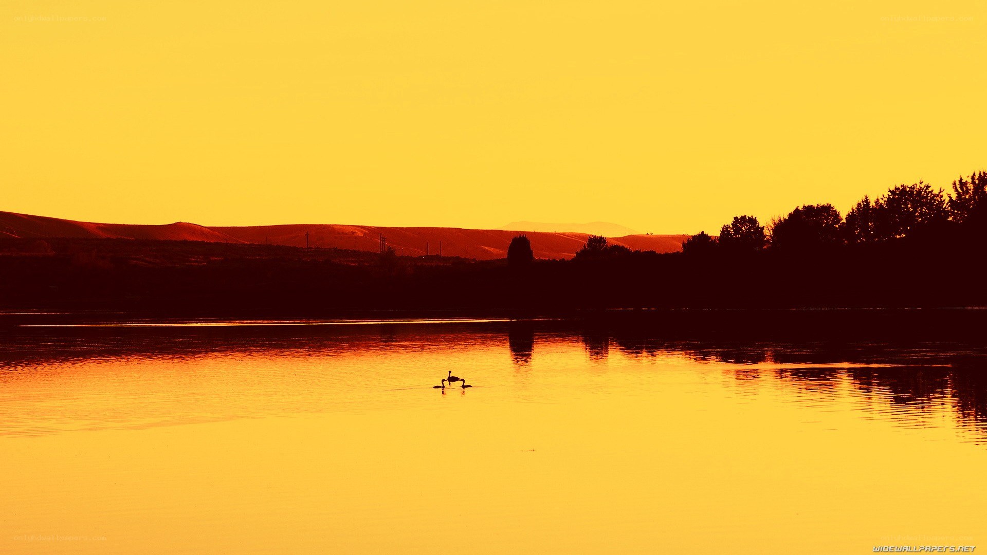 Sunset over a calm lake