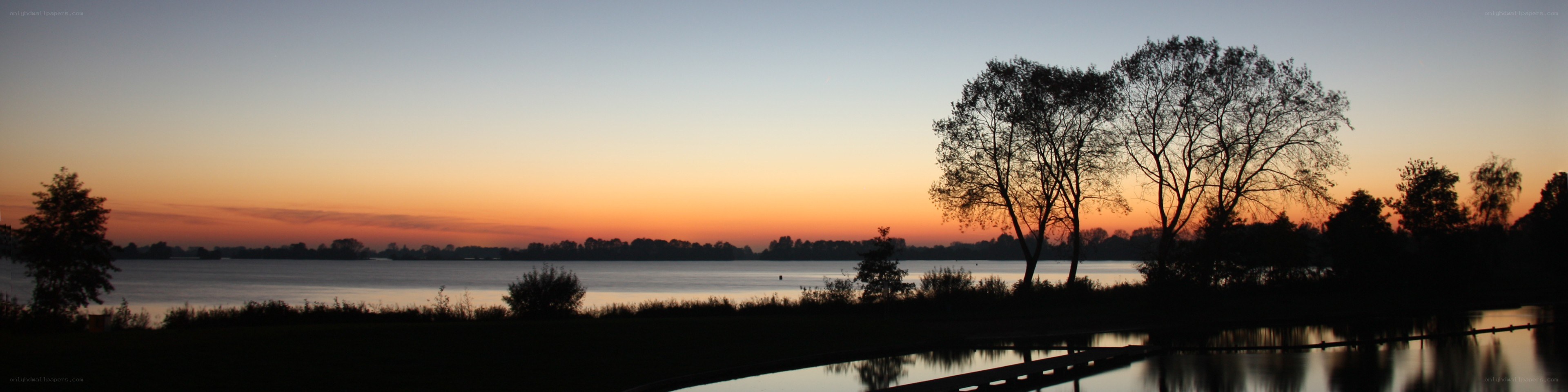 sunset over a calm lake