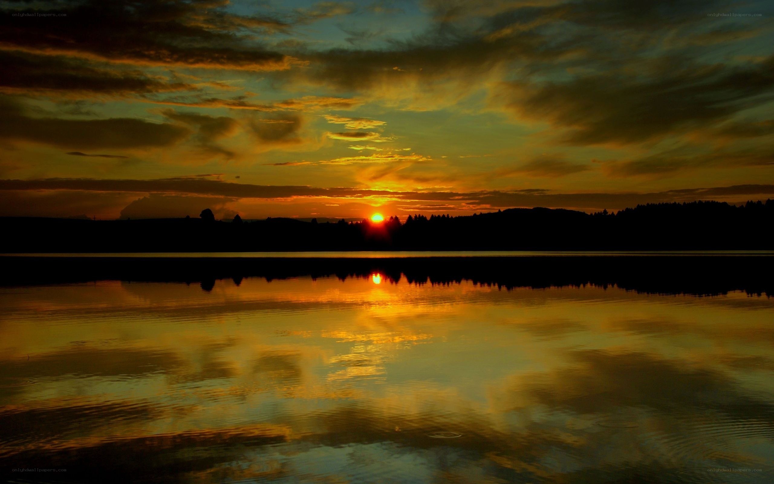 Sunset over a calm lake