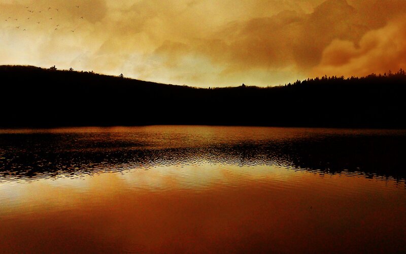 sunset over a calm lake
