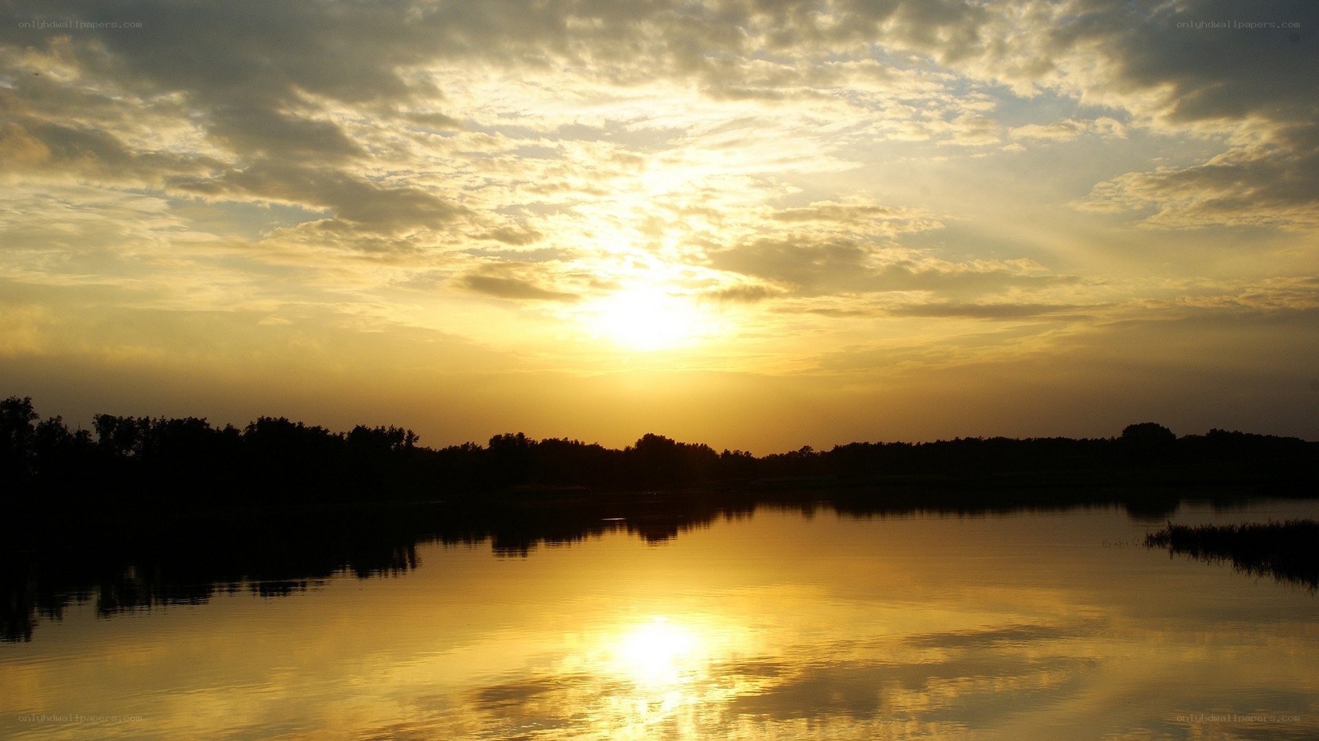 Sunset over a calm lake