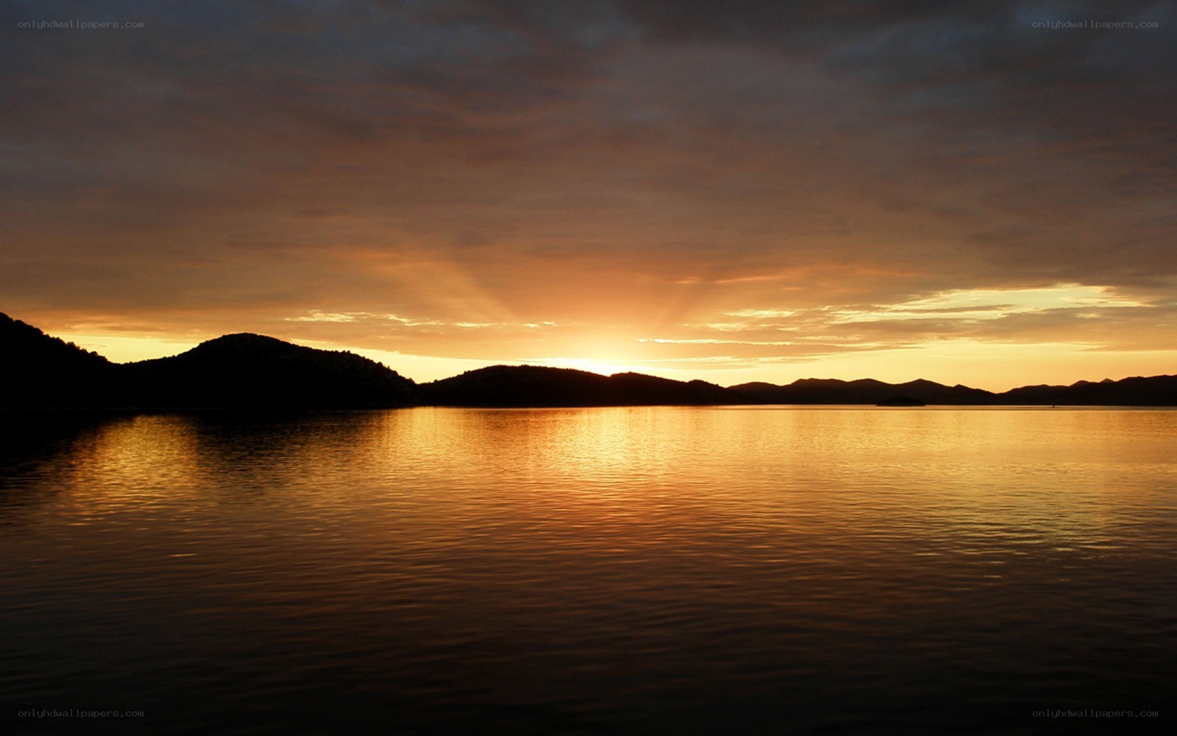 Sunset over a calm lake