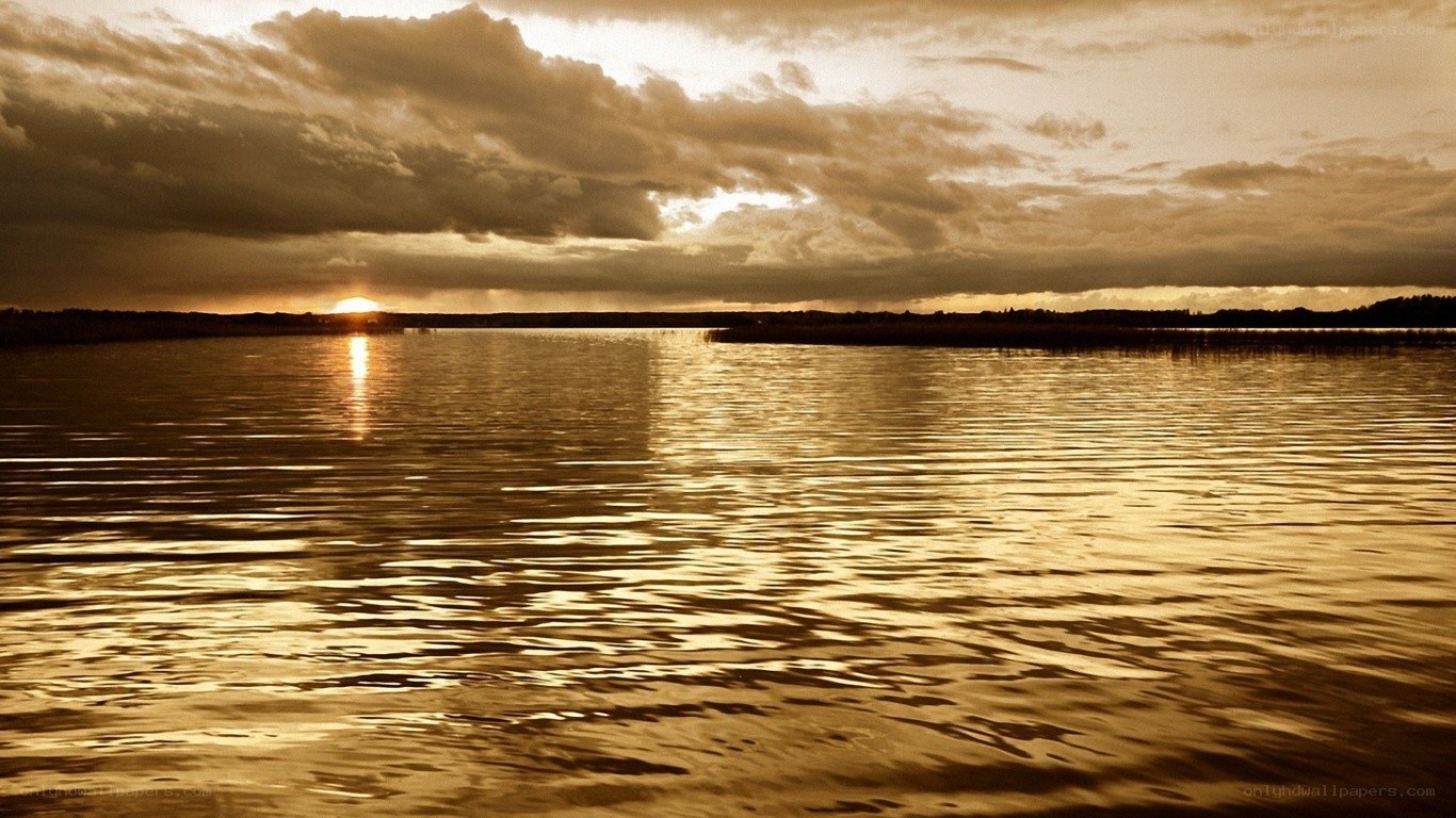 sunset over a calm lake
