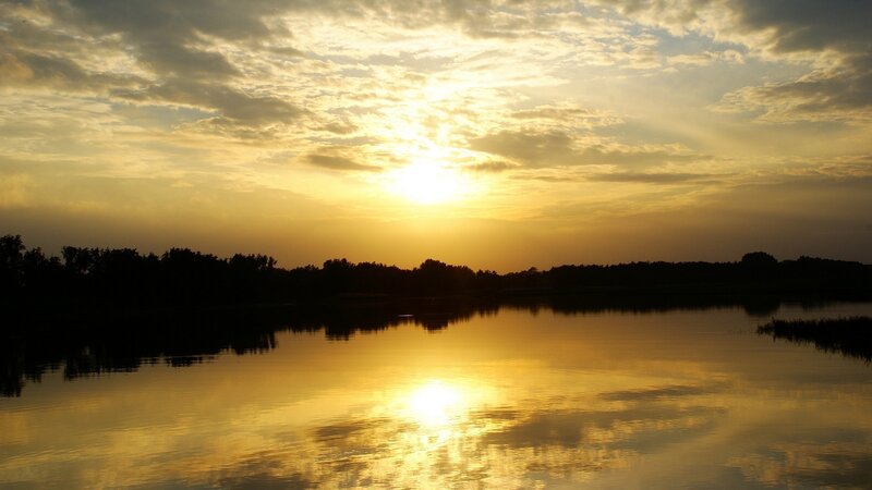 Sunset over a calm lake