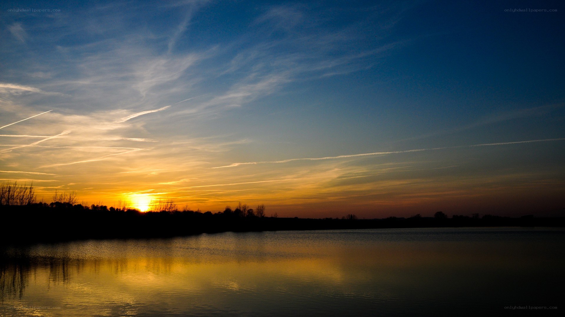 Sunset over a calm lake
