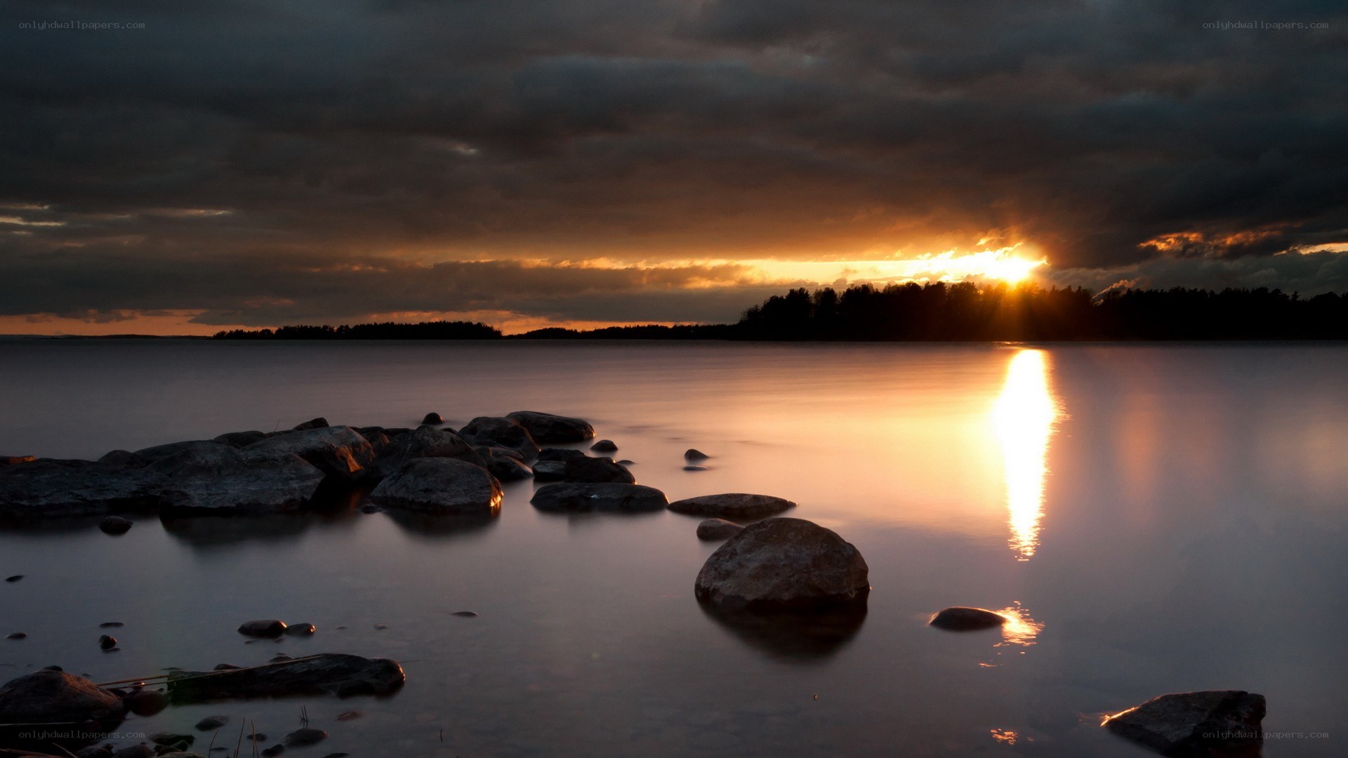 sunset over a calm lake