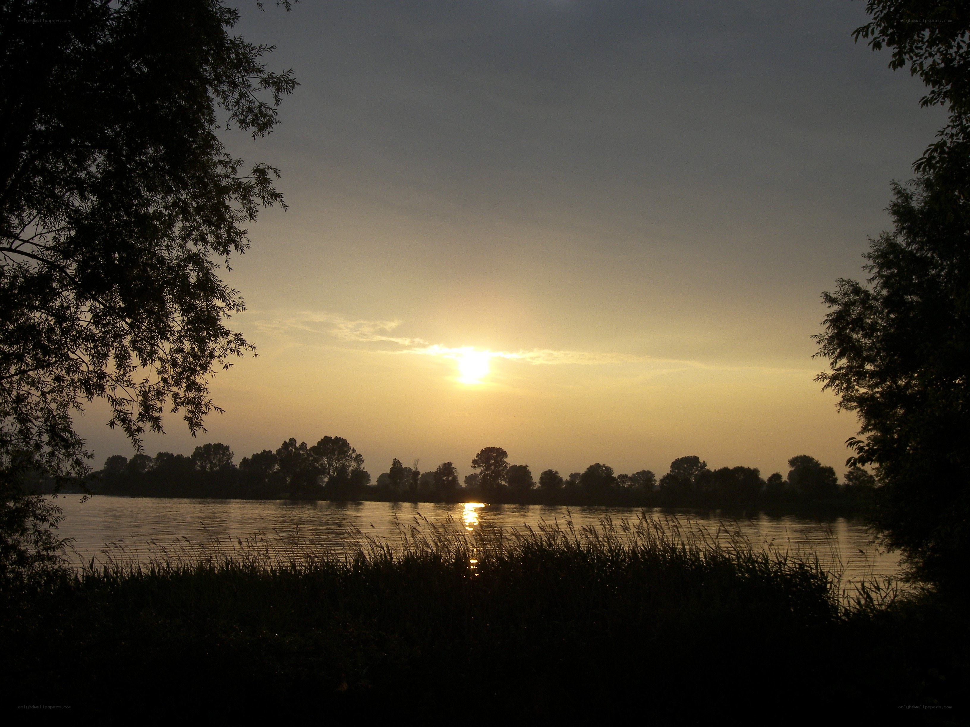 Sunset over a calm lake
