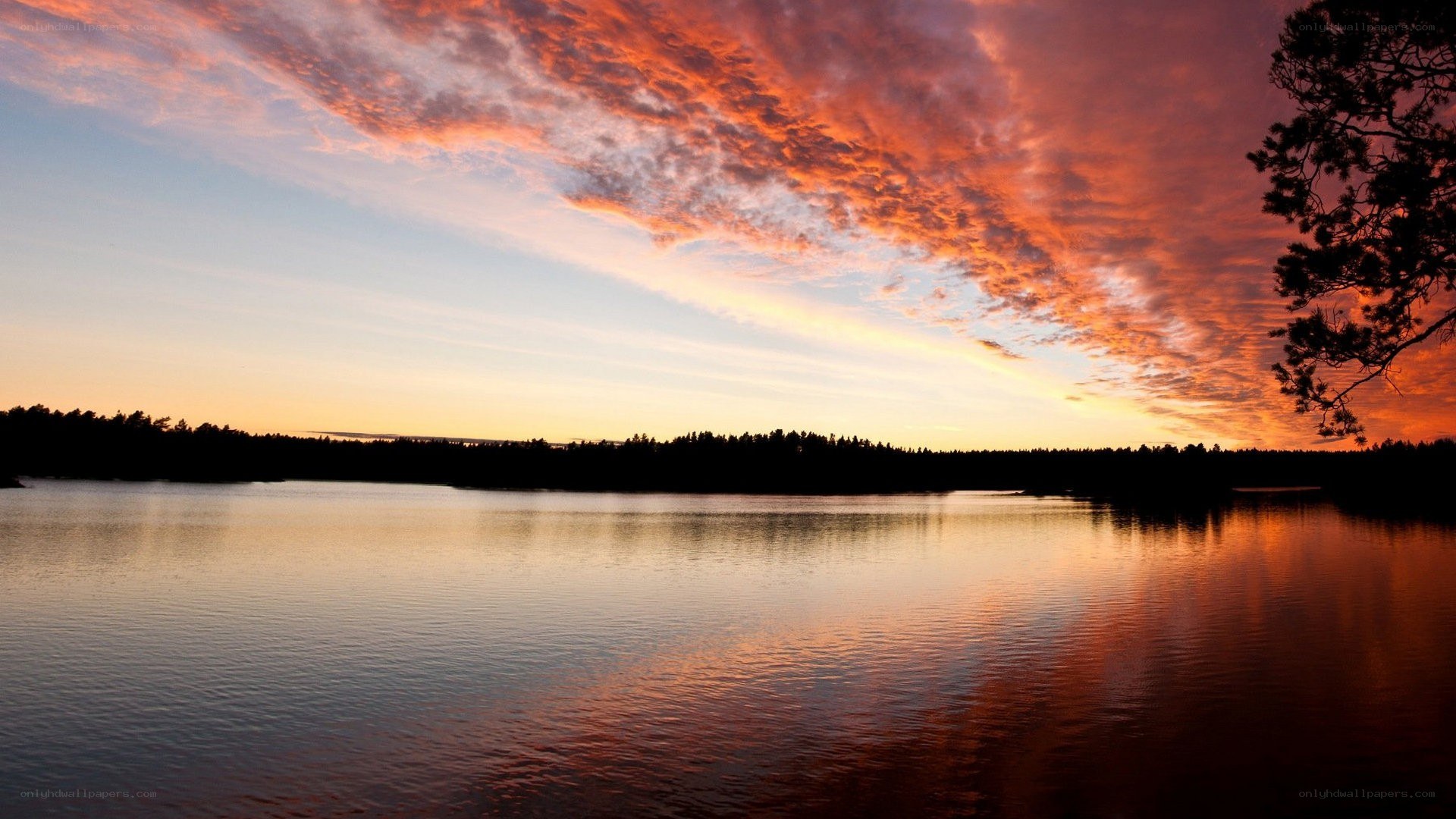 sunset over a calm lake