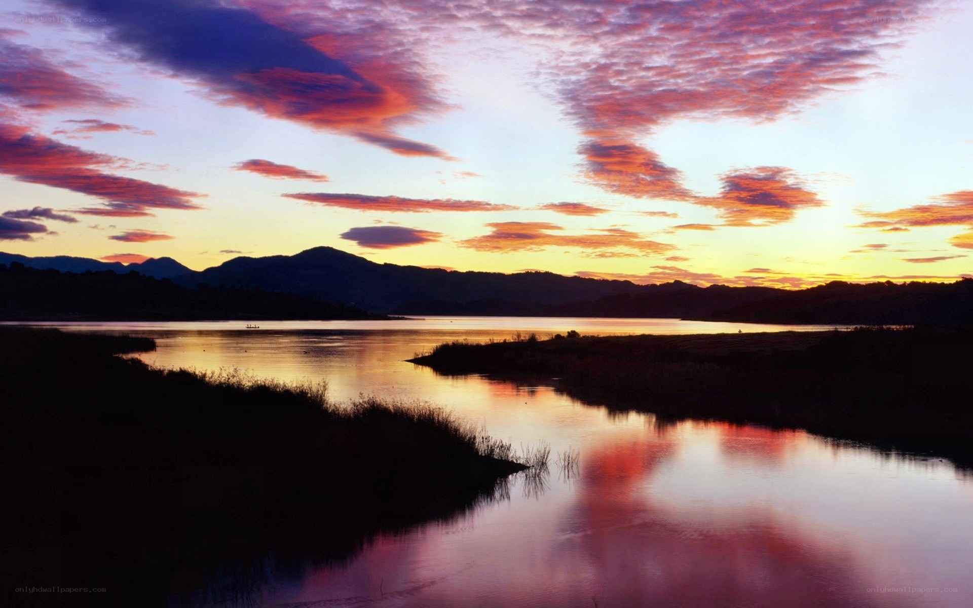 sunset over a calm lake