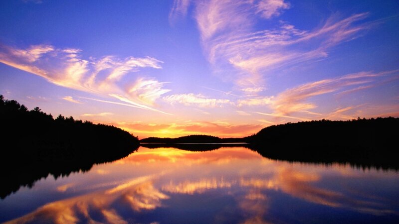 sunset over a calm lake