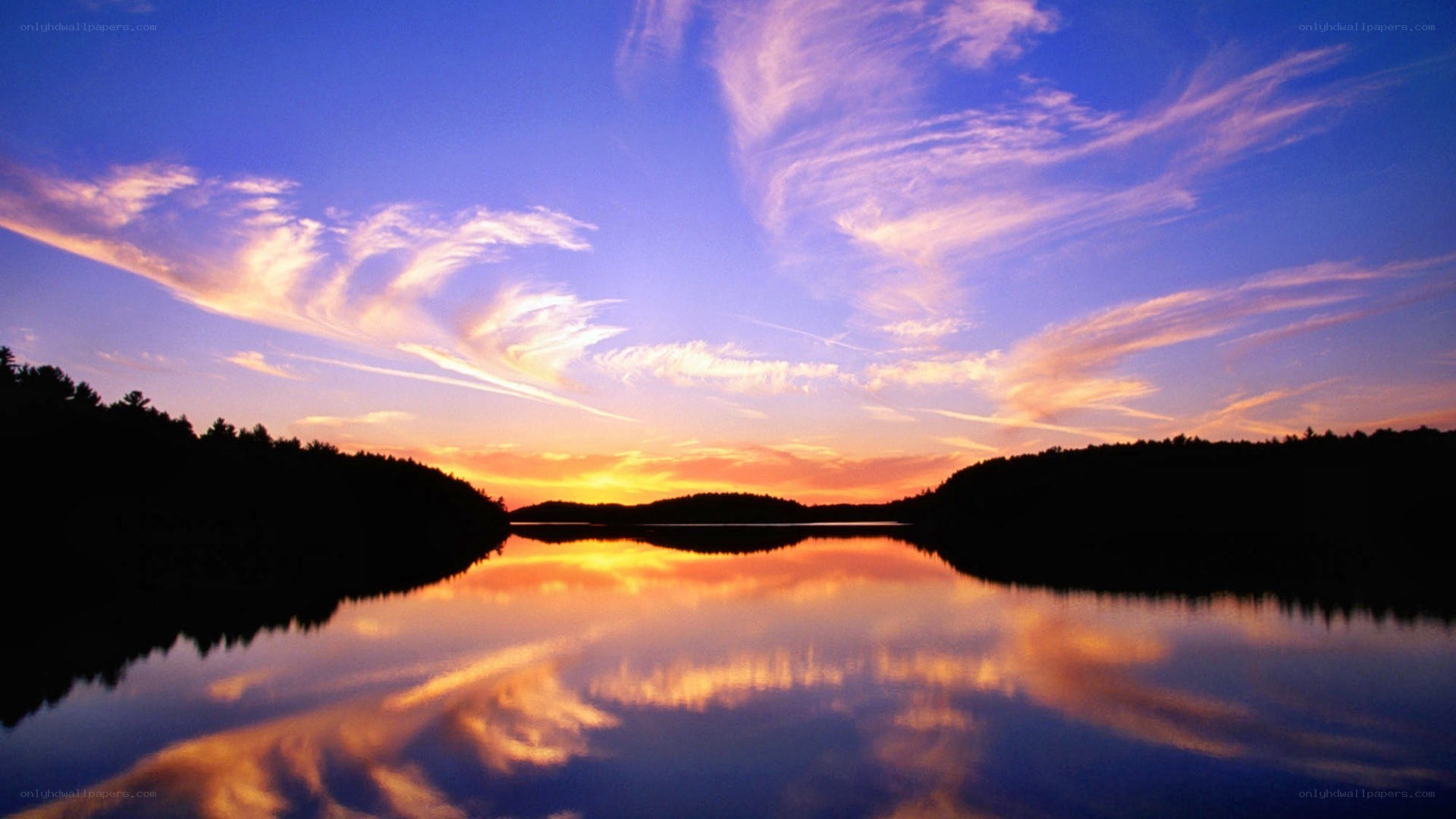 sunset over a calm lake