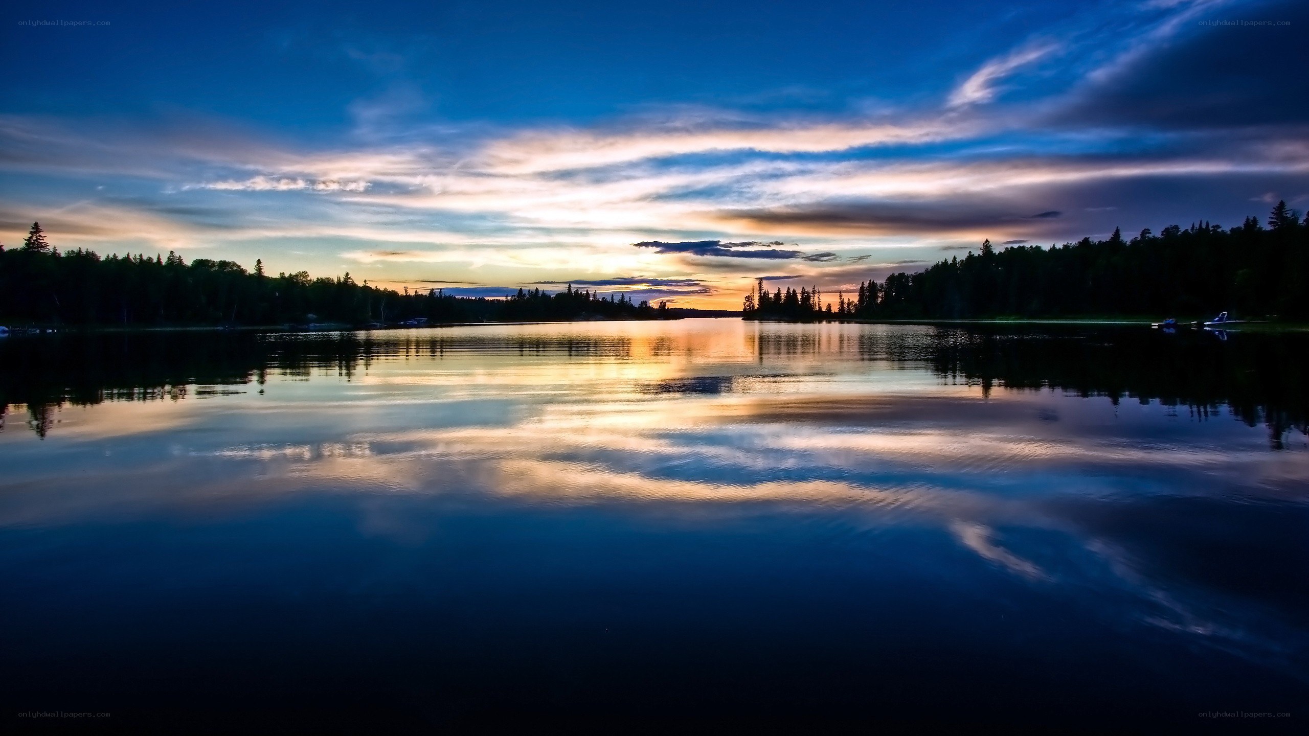 sunset over a calm lake