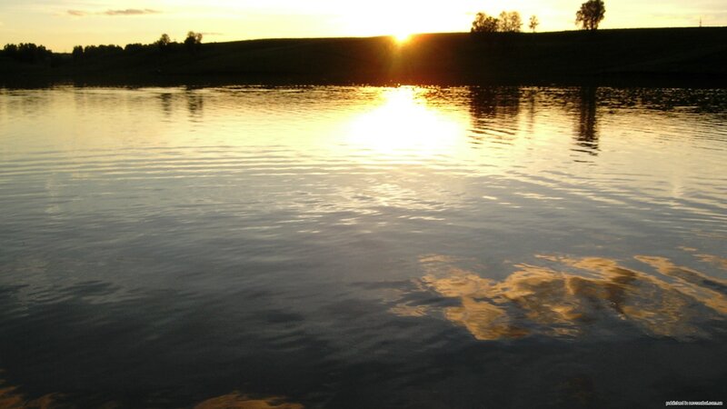 Sunset over a calm lake