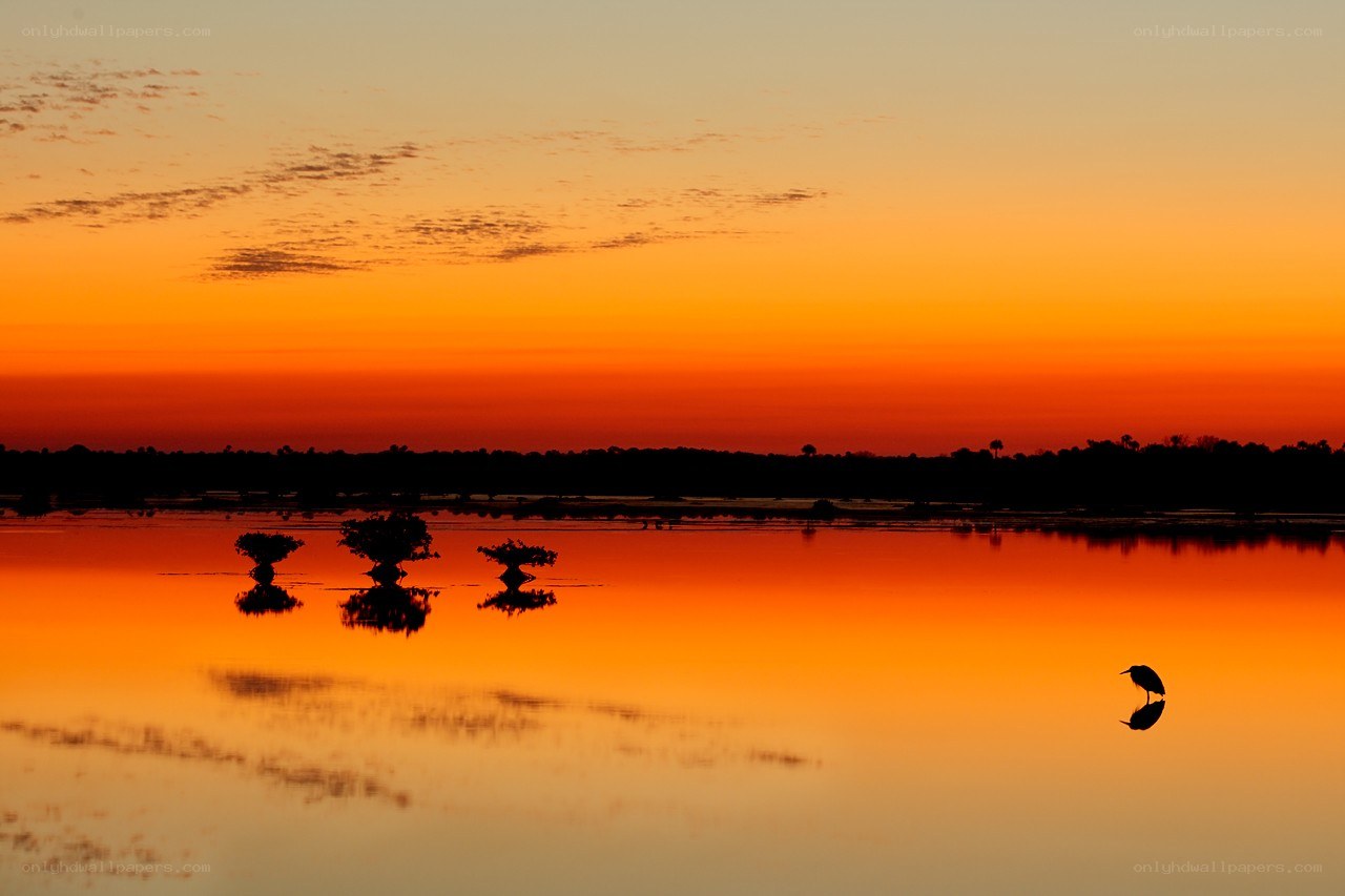 Sunset over a calm lake