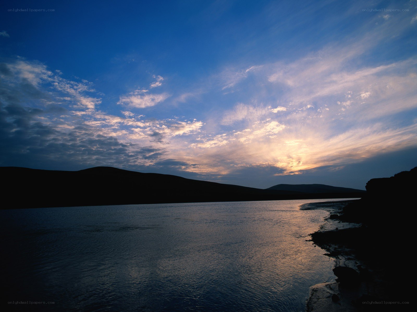 Sunset over a calm lake