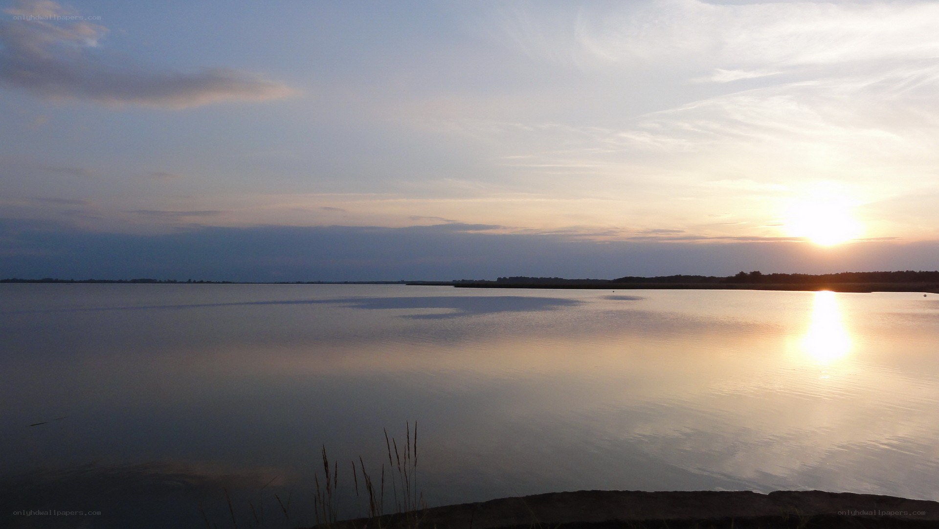 Sunset over a calm lake