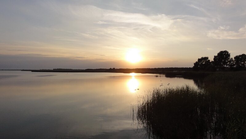 Sunset over a calm lake