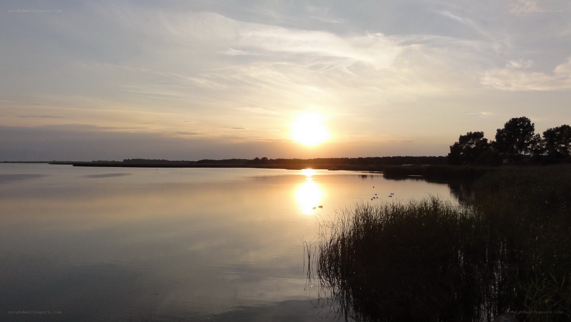 Sunset over a calm lake