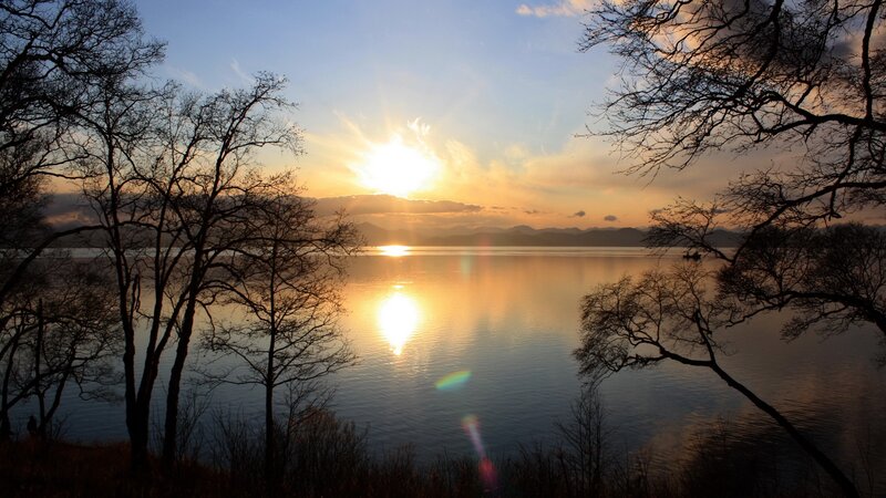 Sunset over a calm lake