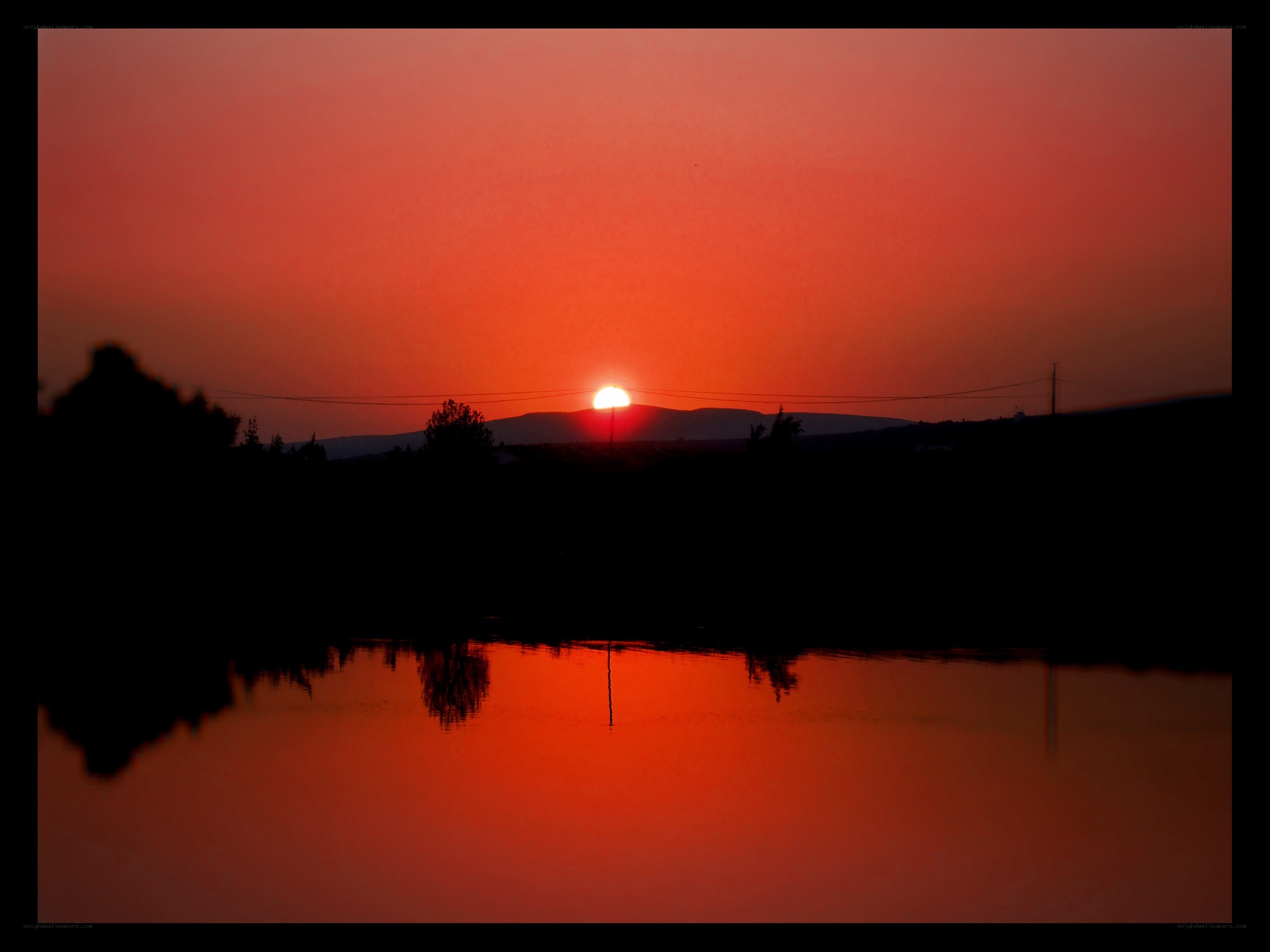 Sunset over a calm lake