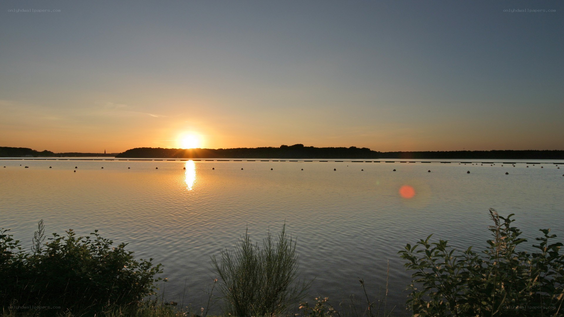 Sunset over a calm lake