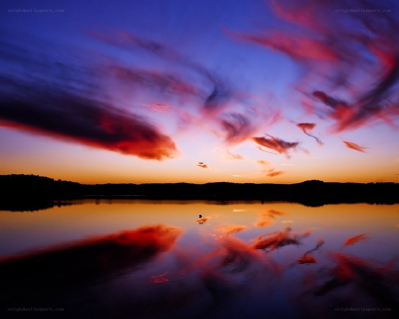 Sunset over a calm lake