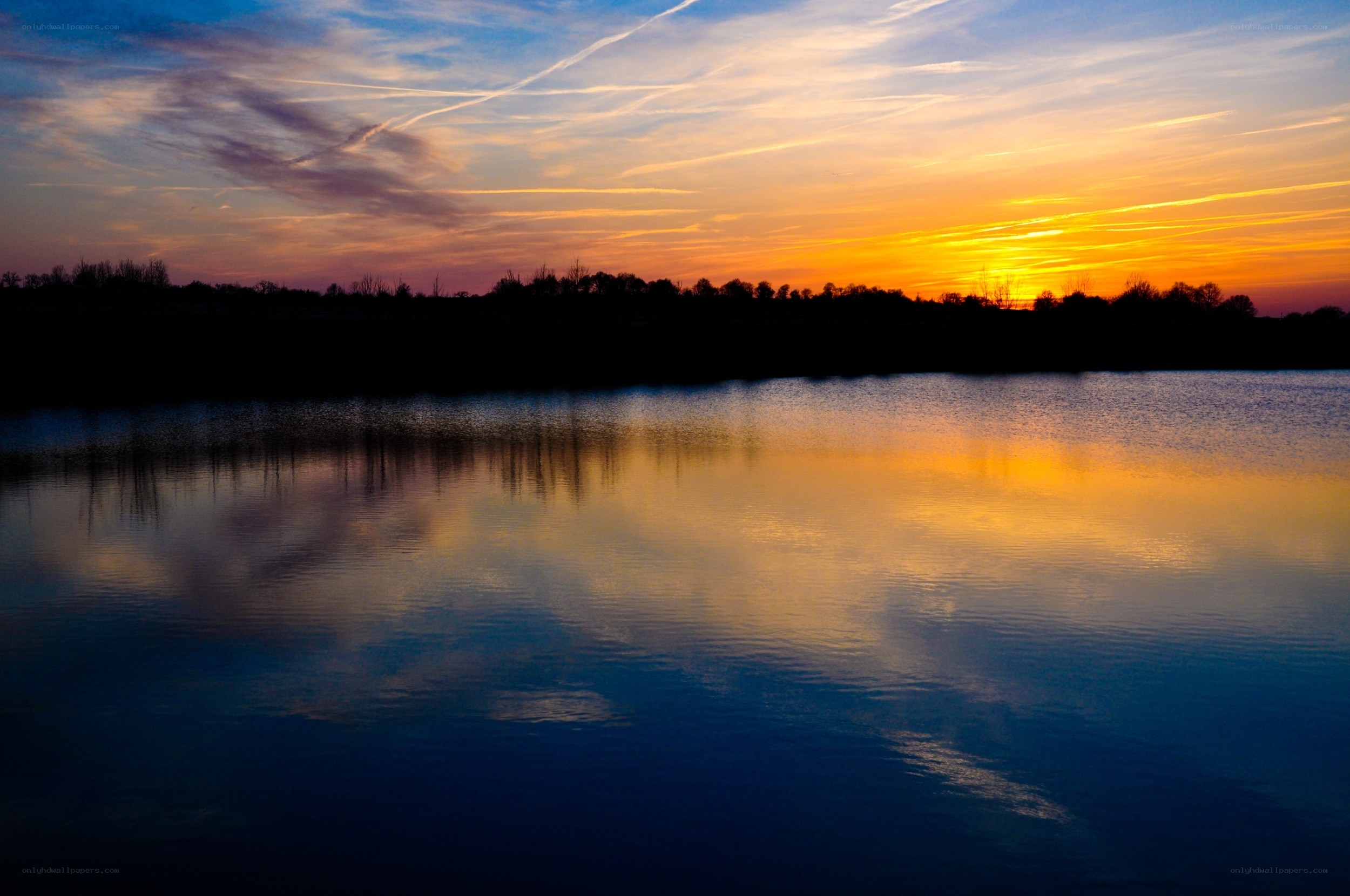 Sunset over a calm lake