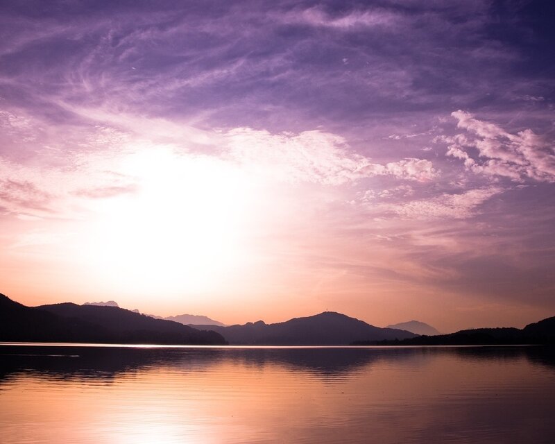 sunset over a calm lake