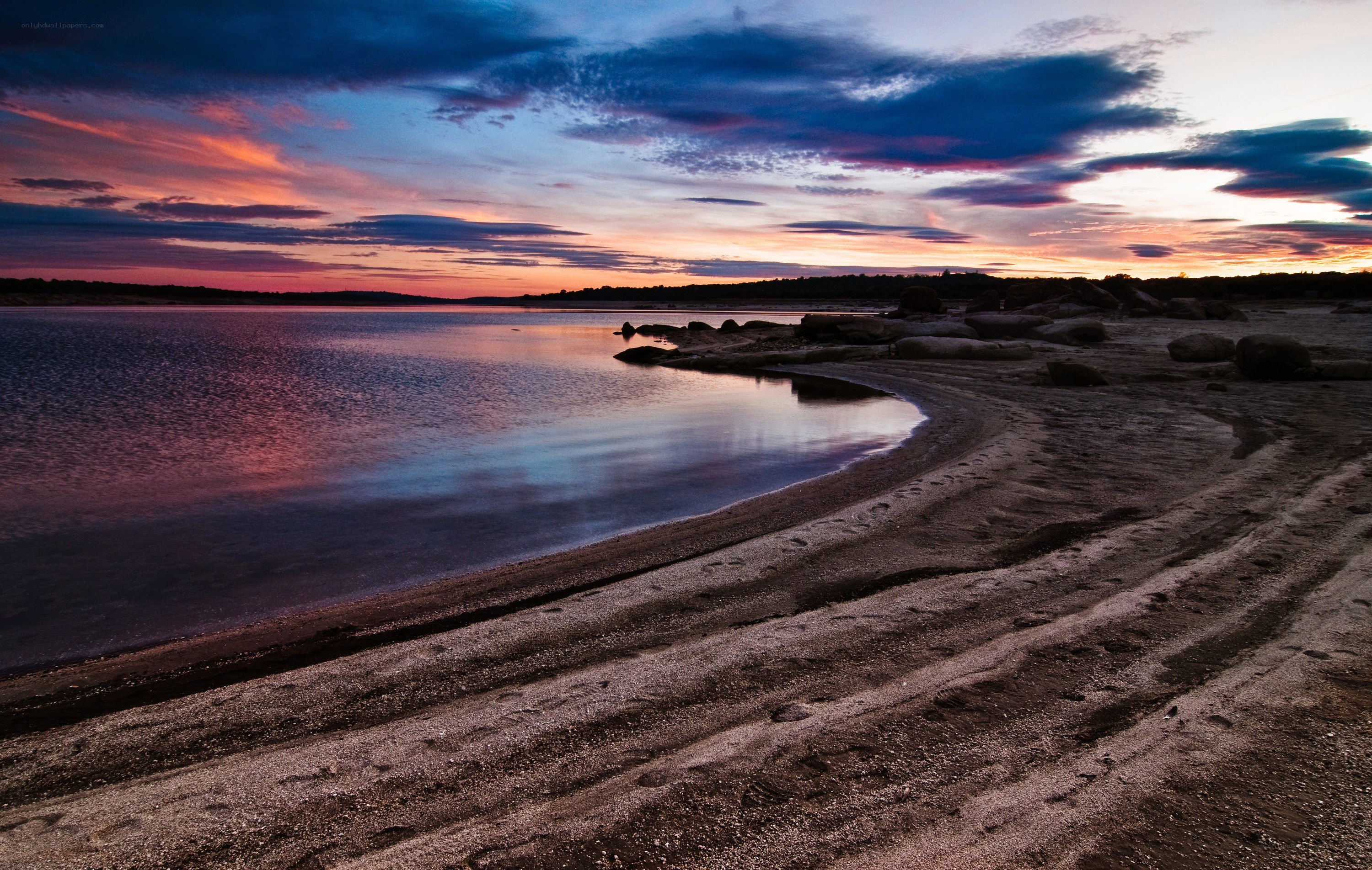 sunset over a calm lake