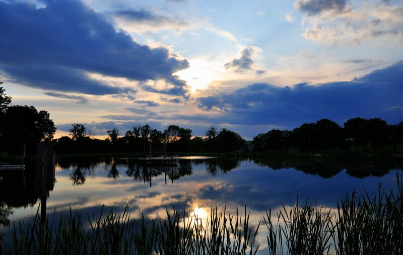 sunset over a calm lake