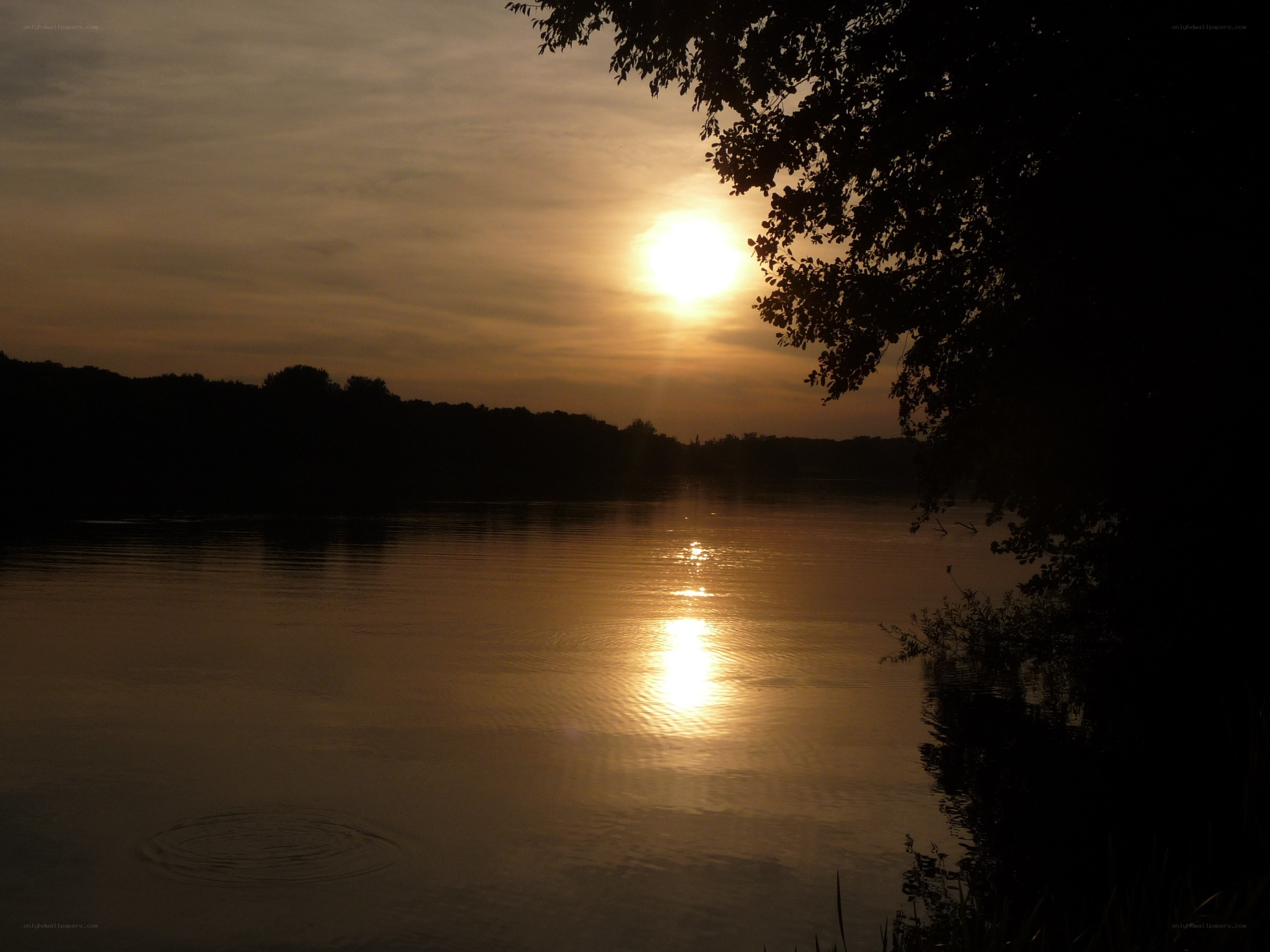 Sunset over a calm lake