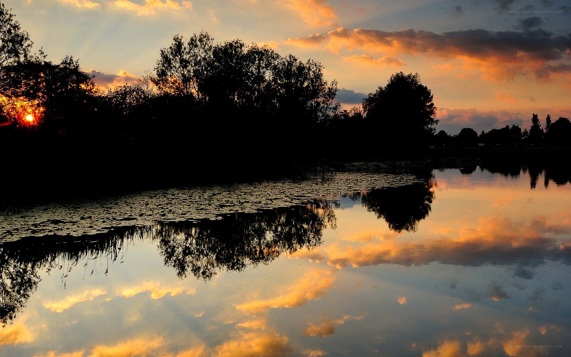 Sunset over a calm lake