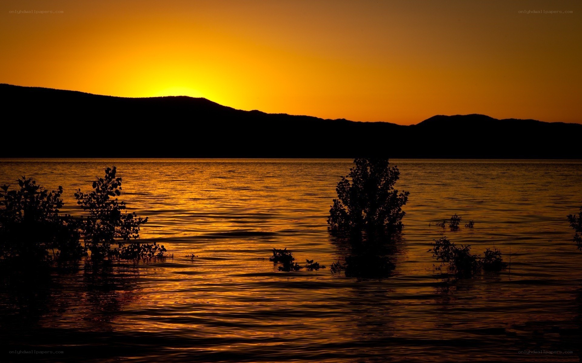 Sunset over a calm lake