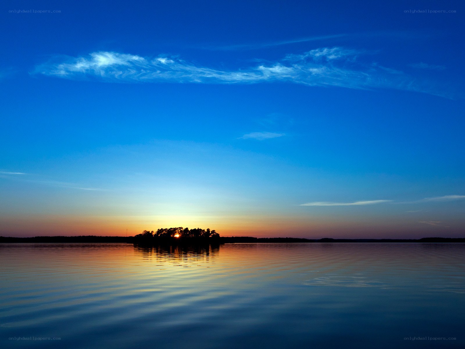 sunset over a calm lake