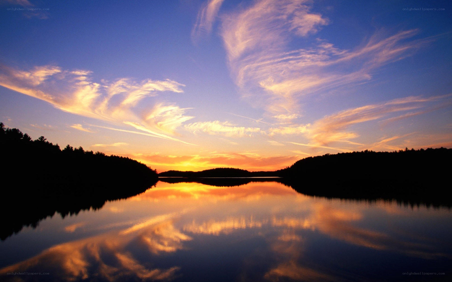 sunset over a calm lake
